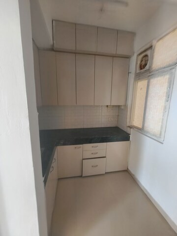 Kitchen in 2 BHK Apartment at Shree Vardhman Green Court, Sector 90 – for Rent