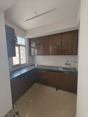 Kitchen in 2 BHK Apartment at Shree Vardhman Green Court, Sector 90 – for Rent