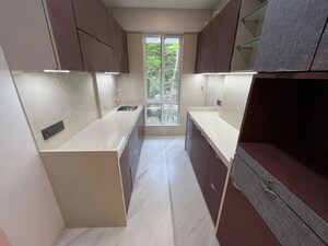 Kitchen in 2 BHK Apartment at Perna Perm Milan CHS, Mahim – for Sale