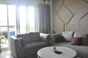 Living Room in 3 BHK Apartment at Emaar The Palm Drive-Palm Studios, Sector 66 – for Sale