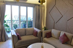 Living Room in 3 BHK Apartment at Emaar The Palm Drive-Palm Studios, Sector 66 – for Sale