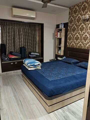 Bedroom in 2 BHK Apartment at Sankalpit CHS, Goregaon East – for Rent
