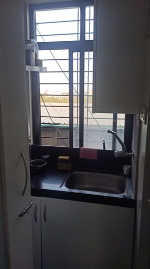 Kitchen in 1 BHK Apartment at Shri Towars, Aundh – for Rent