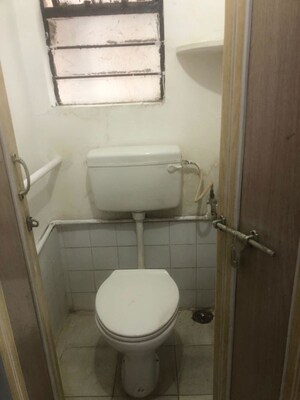 Bathroom in 1 BHK Apartment at Shriram Nagar CHS, Aundh – for Rent