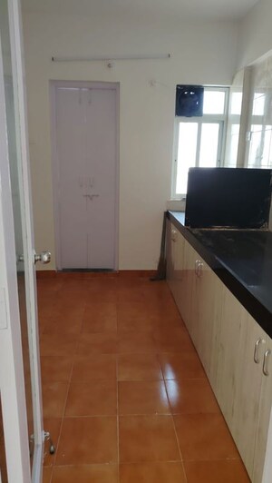 Kitchen in 2 BHK Apartment at Kumar Padmalaya, Aundh – for Rent