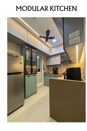 Kitchen in 2 BHK Apartment at Dosti West County, Balkum Pada – for Rent