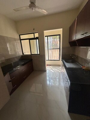 Kitchen in 2 BHK Apartment at Devi Lotus, Bopodi – for Sale