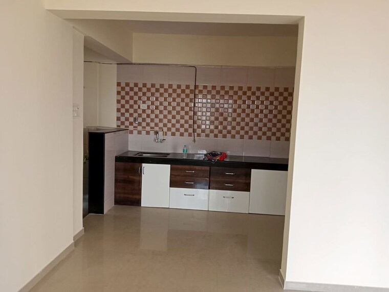 Kitchen, devi-lotus 2 Bedroom 900 Sq.Ft. Apartment In Bopodi Pune 10020338
