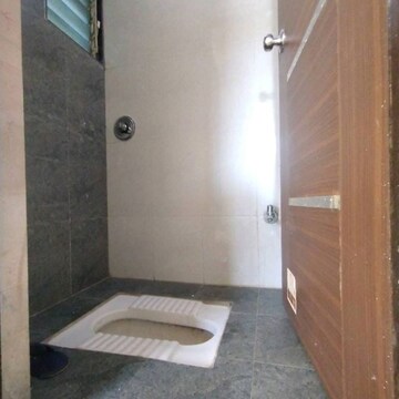 Bathroom in 2 BHK Apartment at Mayflower Apartment Kamothe, Kamothe Sector 34 – for Sale