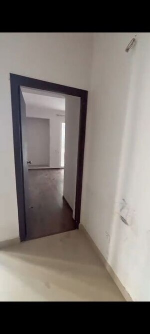 Building Lobby in 2 BHK Apartment at Tulsiani Urban Woods, Sushant Golf City – for Sale