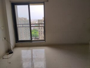 Living Room in 2 BHK Apartment at Amraiwadi – for Sale