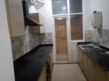 Kitchen in 3.5 BHK Apartment at Amrapali Leisure Valley, Tech Zone 4 Greater Noida – for Sale