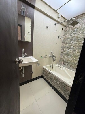Bathroom in 3 BHK Apartment at Cosmos Paradise Complex, Thane West – for Rent