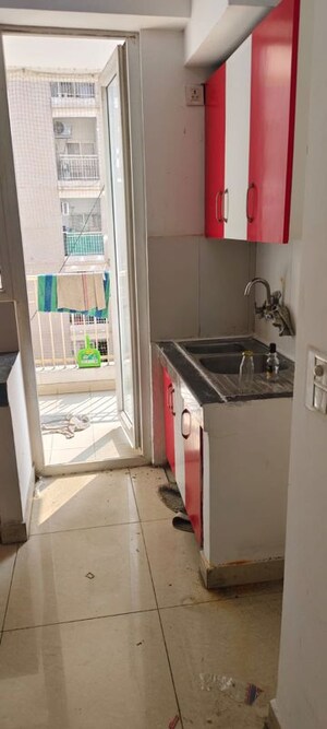 Kitchen in 4 BHK Apartment at Amrapali Heartbeat City, Sector 107 – for Rent