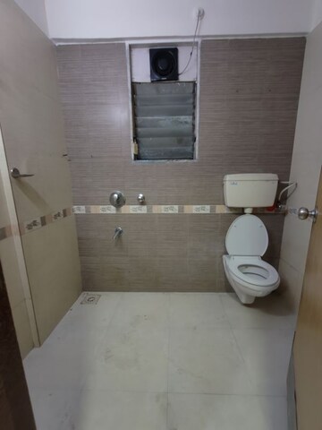 Bathroom in 2 BHK Apartment at Gulmohar Upvan CHS, Gawand Baug – for Rent
