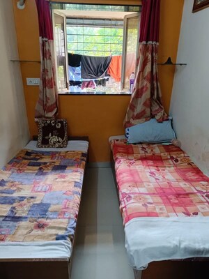 Bedroom in 1 BHK Apartment at New Dev Chhaya Premises CHS, Goregaon West – for Rent