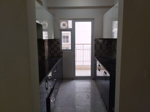 Building Lobby in 3 BHK Apartment at VVIP Homes, Gaur City 2 – for Sale