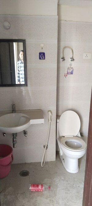 Bathroom in 4 BHK Apartment at Windsor Paradise 2, Raj Nagar Extension – for Rent