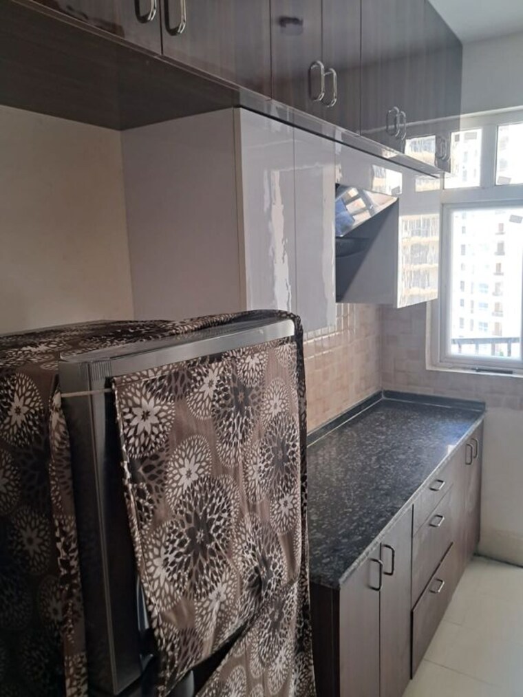 Kitchen, amrapali-heartbeat-city 2 Bedroom 1195 Sq.Ft. Apartment In Sector 107 Noida 10020662