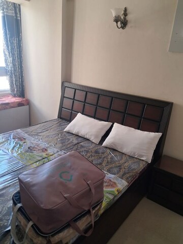Bedroom in 2 BHK Apartment at Amrapali Heartbeat City, Sector 107 – for Rent
