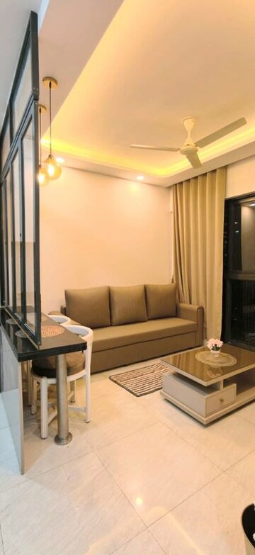 Living Room in 1 BHK Apartment at Lodha Crown Quality Homes, Majiwada – for Rent