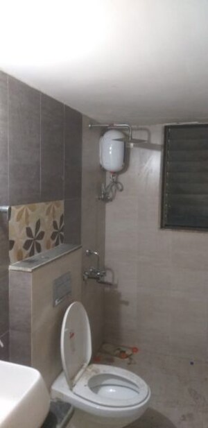 Bathroom in 3 BHK Apartment at Jangid Galaxy, Ghodbunder Road – for Rent