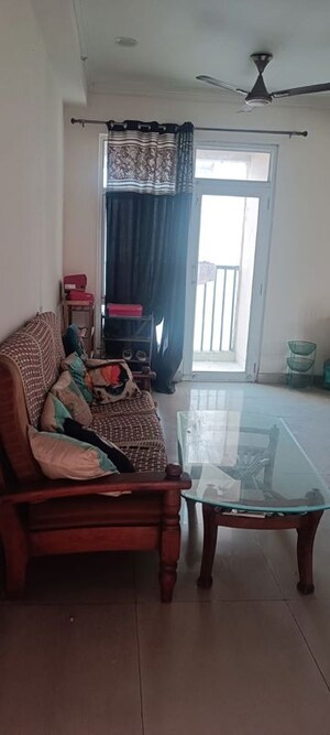 Living Room in 2.5 BHK Apartment at Gaur City 6th Avenue, Sector 4 Greater Noida – for Rent