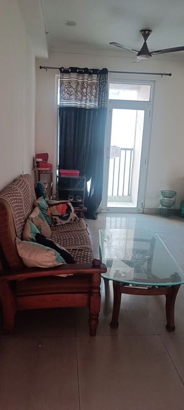 Living Room in 2.5 BHK Apartment at Gaur City 6th Avenue, Sector 4 Greater Noida – for Rent