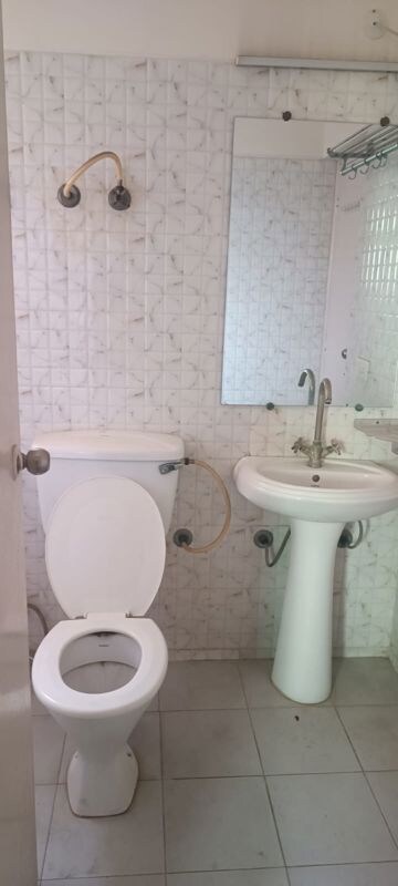 Bathroom in 2.5 BHK Apartment at Gaur City 6th Avenue, Sector 4 Greater Noida – for Rent