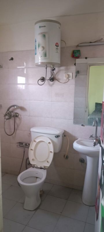 Bathroom in 2.5 BHK Apartment at Gaur City 6th Avenue, Sector 4 Greater Noida – for Rent