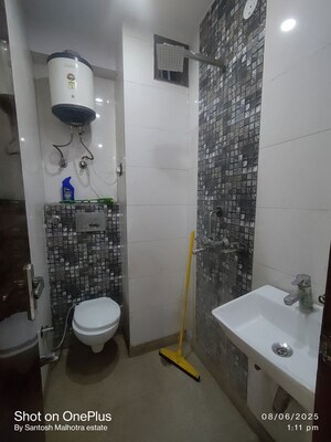 Bathroom in 2 BHK Builder Floor at Dwarka Mor – for Rent