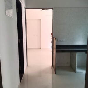 Kitchen in 2 BHK Apartment at Ruparel Sky Green, Shanti Nagar – for Sale