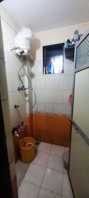 Bathroom in 1 BHK Apartment at Ashtagandha Chs, Seawoods Sector 48 – for Sale