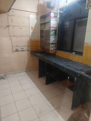 Kitchen in 1 BHK Apartment at Ashtagandha Chs, Seawoods Sector 48 – for Sale