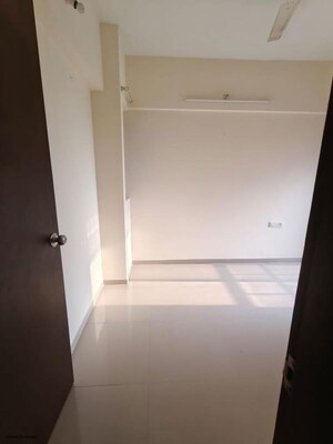 Master Bedroom in 1.5 BHK Apartment at Mantra Insignia, Mundhwa – for Rent