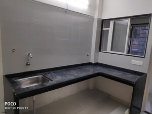 Kitchen in 1.5 BHK Apartment at Mantra Insignia, Mundhwa – for Rent