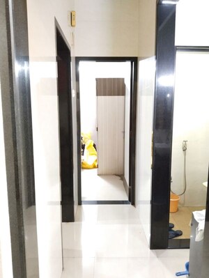 Building Lobby in 2 BHK Apartment at Mangal Gani CHS, New Panvel – for Rent