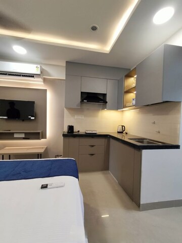 Kitchen in Studio Apartment at Okay Plus Solitaire Suites, Ramnagariya – for Rent