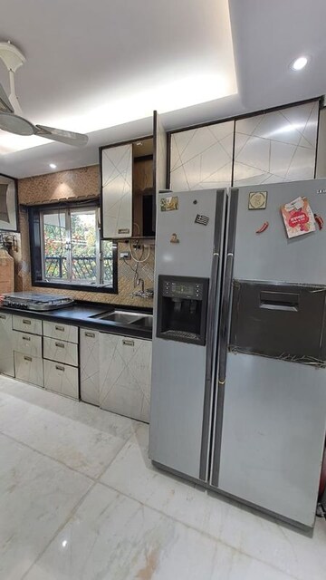 Kitchen in 3 BHK Apartment at Heritage View Vile Parle, Vile Parle West – for Rent