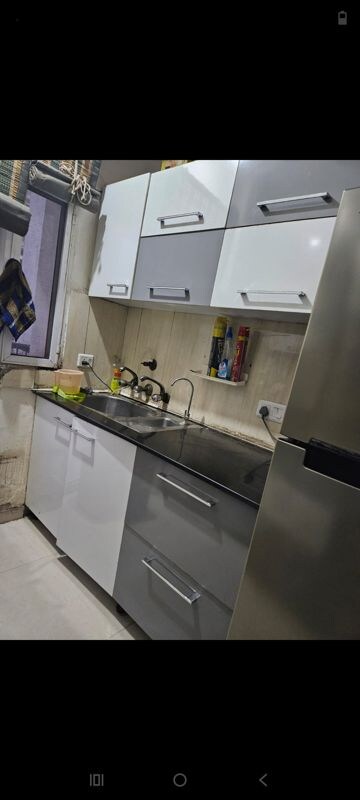 Kitchen in 2.5 BHK Apartment at Express Zenith, Sector 77 – for Rent