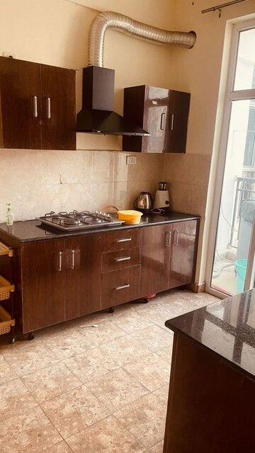 Kitchen in 2 BHK Apartment at Ansal API Celebrity Gardens, Sushant Golf City – for Rent