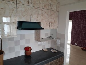 Kitchen in 3 BHK Apartment at Mahagun Moderne, Sector 78 – for Rent