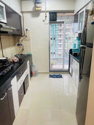 Kitchen in 1 BHK Apartment at Unique Greens Ghodbunder Road, Ghodbunder Road – for Rent