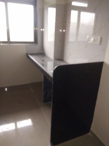 Kitchen in 1 BHK Apartment at Puranik Aarambh, Ghodbunder Road – for Rent