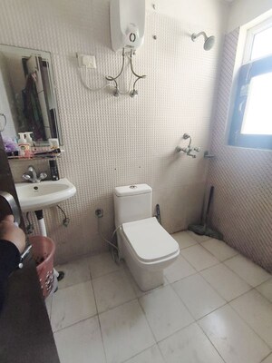 Bathroom in 2 BHK Apartment at NK Sharma Savitry Greens 2, Ghazipur – for Rent