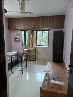 Bedroom in 2 BHK Apartment at Woodland Avenue, Kothrud – for Rent