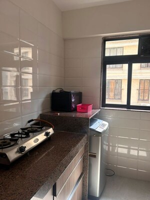 Kitchen in 2 BHK Apartment at Chandiwala Pearl Heaven, Andheri East – for Rent