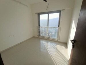 Room in 2 BHK Apartment at Omkar Signet, Malad East – for Rent