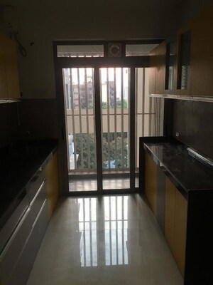 Kitchen in 3 BHK Apartment at Anmol Tower, Goregaon West – for Rent