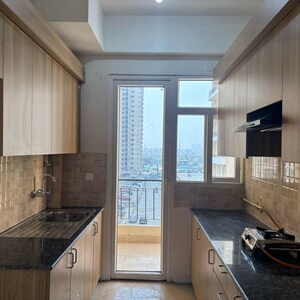 Kitchen in 3 BHK Apartment at Amrapali Crystal Homes, Sector 76 – for Rent